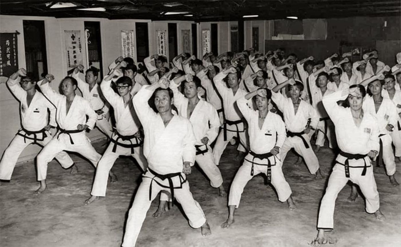 Supreme Grand Master Bok Man Kim leading a black-belt class in Korea